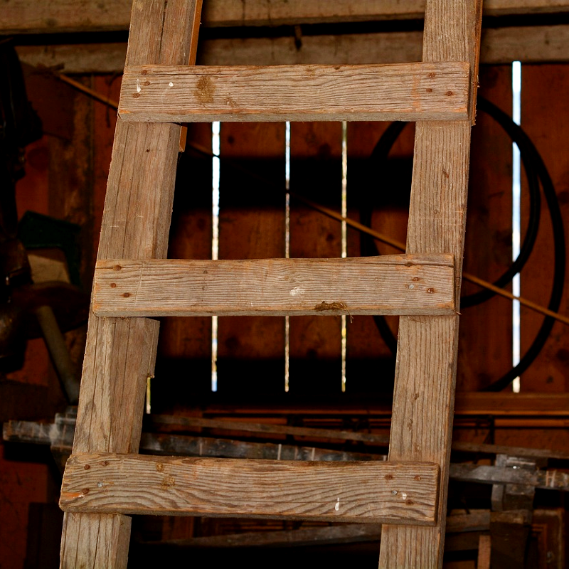 This image depicts a wooden ladder in a barn, representing the variety of rural sounds that one might find in a sound effects library on Sonniss.